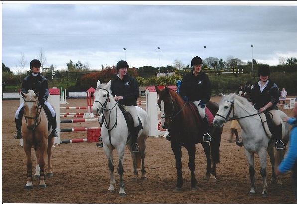 Image of adults riding